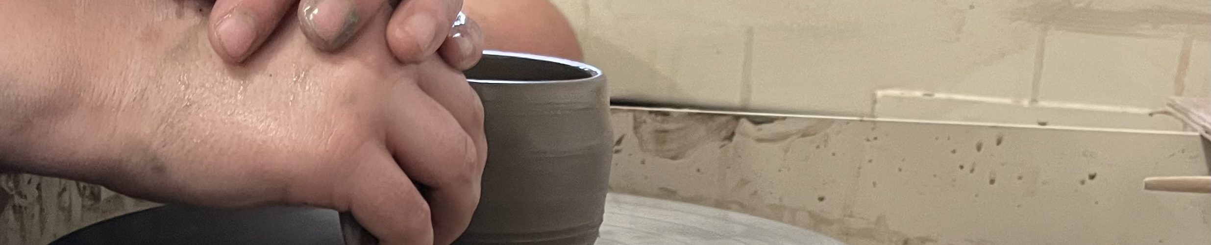 throwing on the potter's wheel